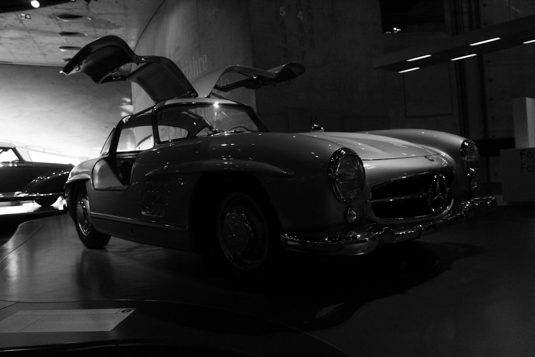 A classic mercedes-benz with gullwing doors.