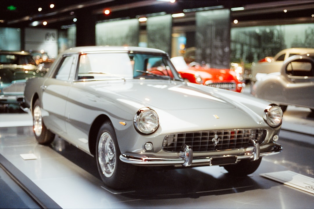 Vintage silver ferrari coupe on display